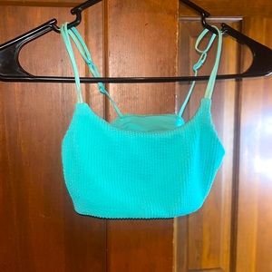 Has great material and used to be my favorite swim suit! Adjustable straps!